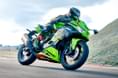 Both the ZX4R and the ZX4RR come to India as CBUs (Completely Built Units). Kawasaki Ninja ZX4RR front right side riding image on track